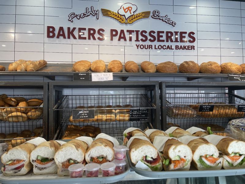 The Bakers Patisseries counter and sign, the first shop Leo built a site for